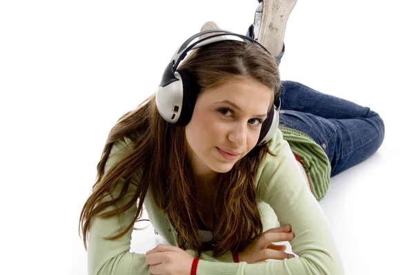 Beautiful young female enjoying music — Stock Photo, Image