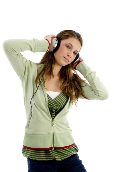 Beautiful fashion girl enjoying music — Stock Photo, Image