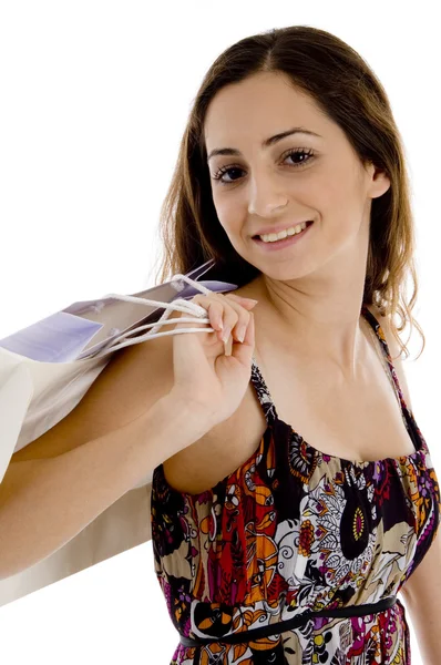 Jovem fêmea com sacos de compras — Fotografia de Stock