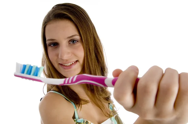 Hermosa joven con cepillo de dientes — Foto de Stock