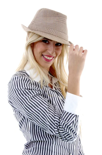 Gorgeous businesswoman holding hat — Stock Photo, Image