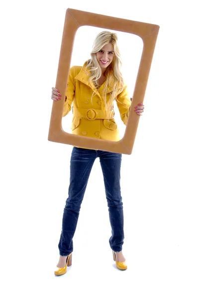 Beautiful model holding frame — Stock Photo, Image