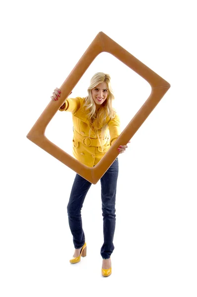 Gorgeous model posing with frame — Stock Photo, Image