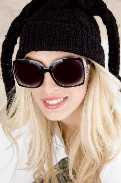 Young beauty in winter cap — Stock Photo, Image