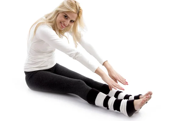 Donna che fa esercizio di stretching — Foto Stock