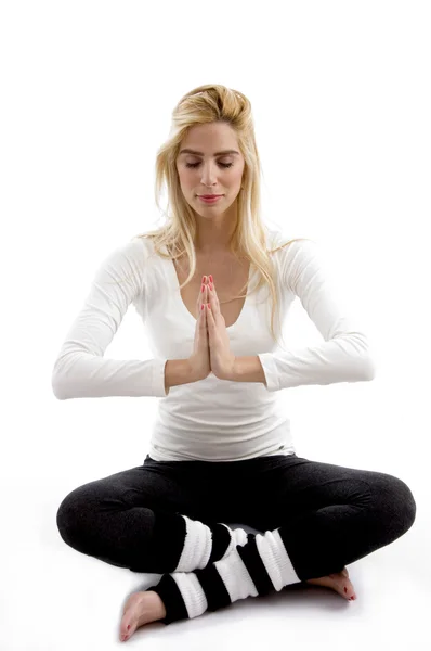 Mujer haciendo yoga y meditando — Foto de Stock