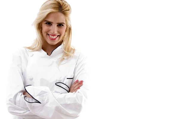 Female cook posing with her arms crossed — Stock Photo, Image