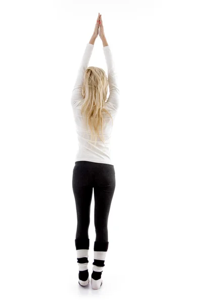 Postura traseira da mulher exercitando — Fotografia de Stock
