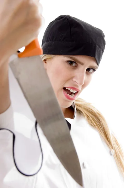 Framifrån av aggressiva kvinnliga kock — Stockfoto
