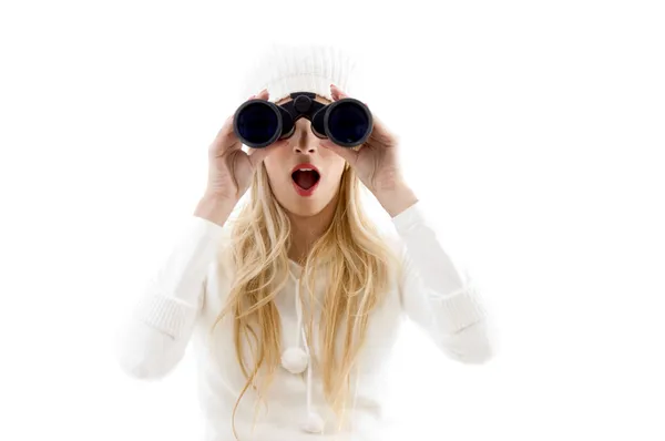 Mujer asombrada mirando a través de binoculares —  Fotos de Stock