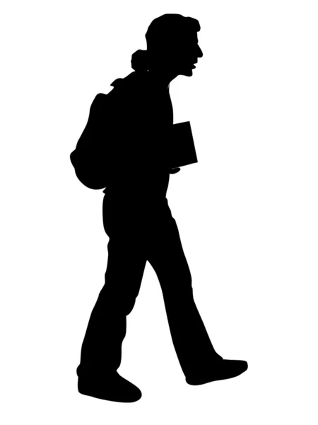 Young student walking with books — Stock Photo, Image