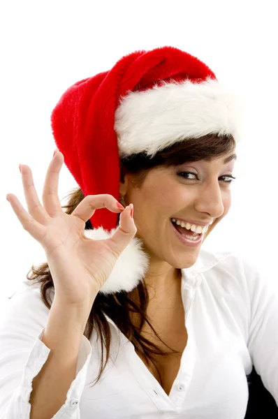 Allegro femmina indossa cappello di Natale Foto Stock