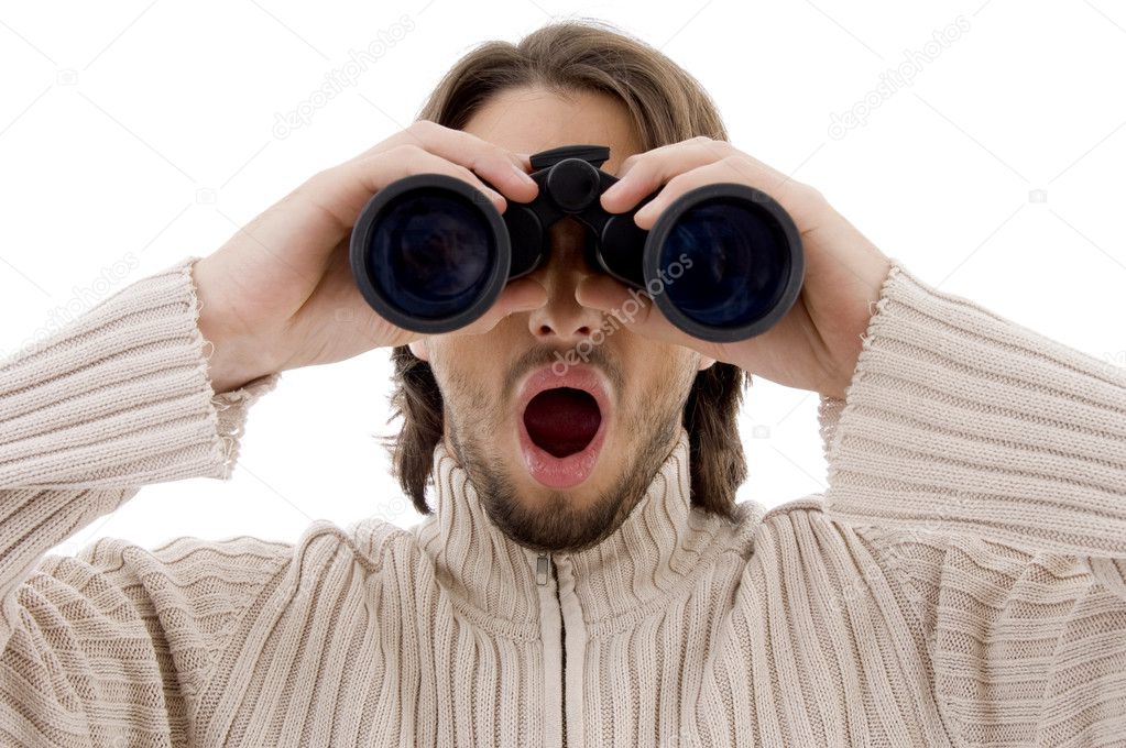 Man watching through binoculars