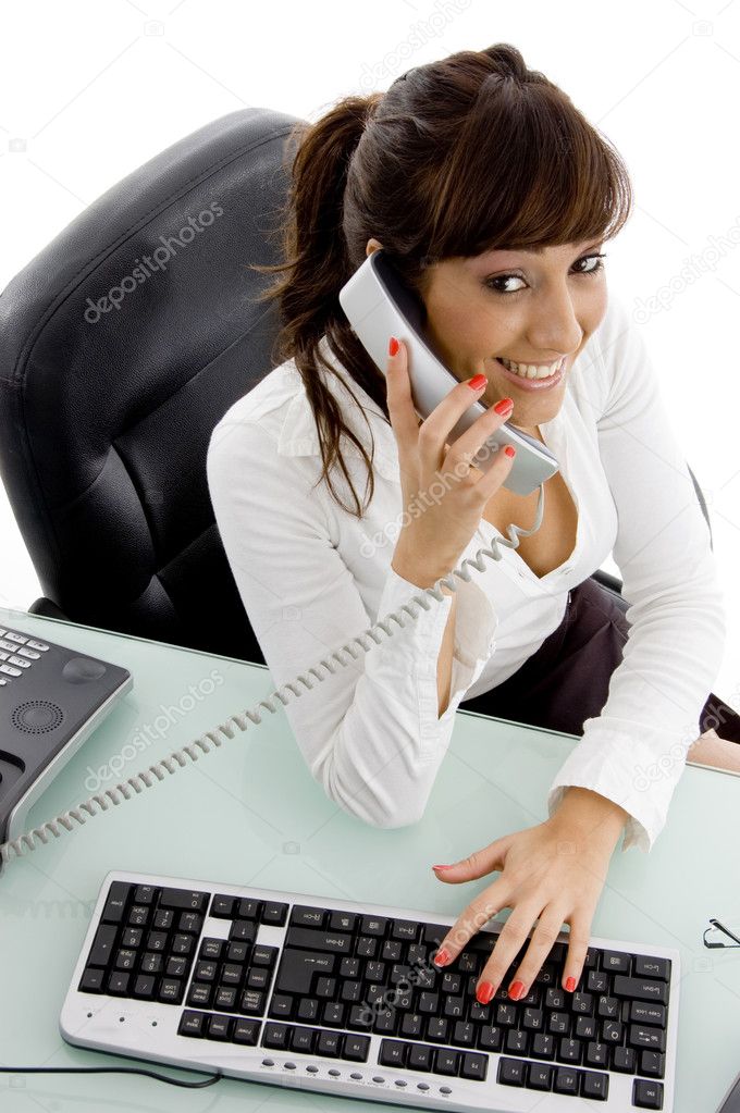 Female executive interacting on phone