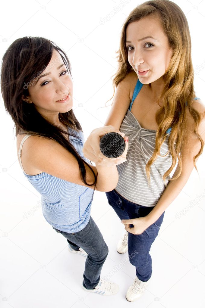 High angle view of young girls with mic