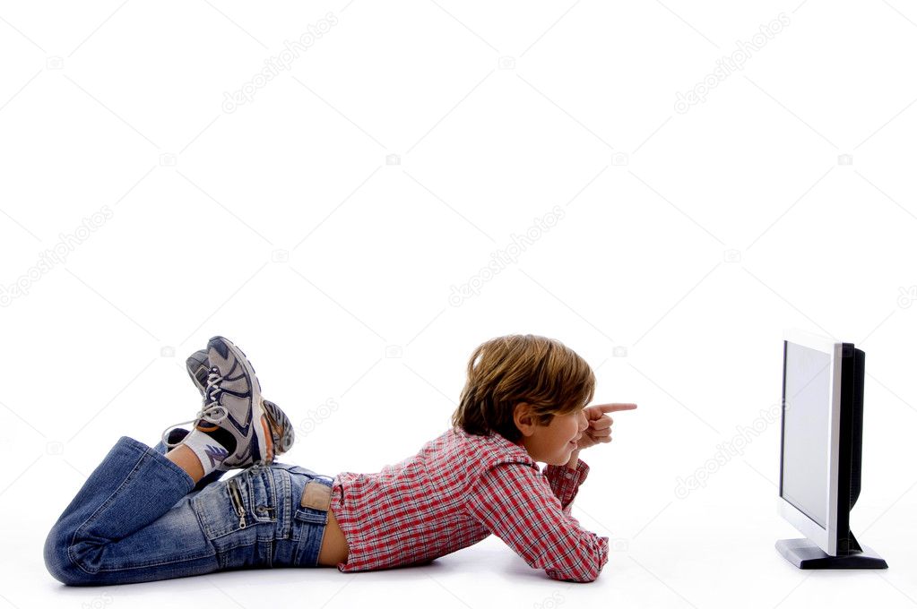 Side pose of boy watching lcd screen