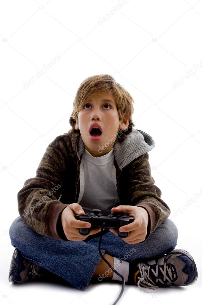 Amazed kid playing videogames