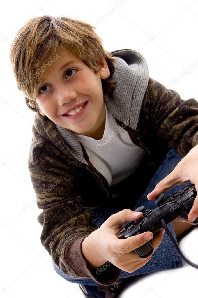 Amused boy playing videogame