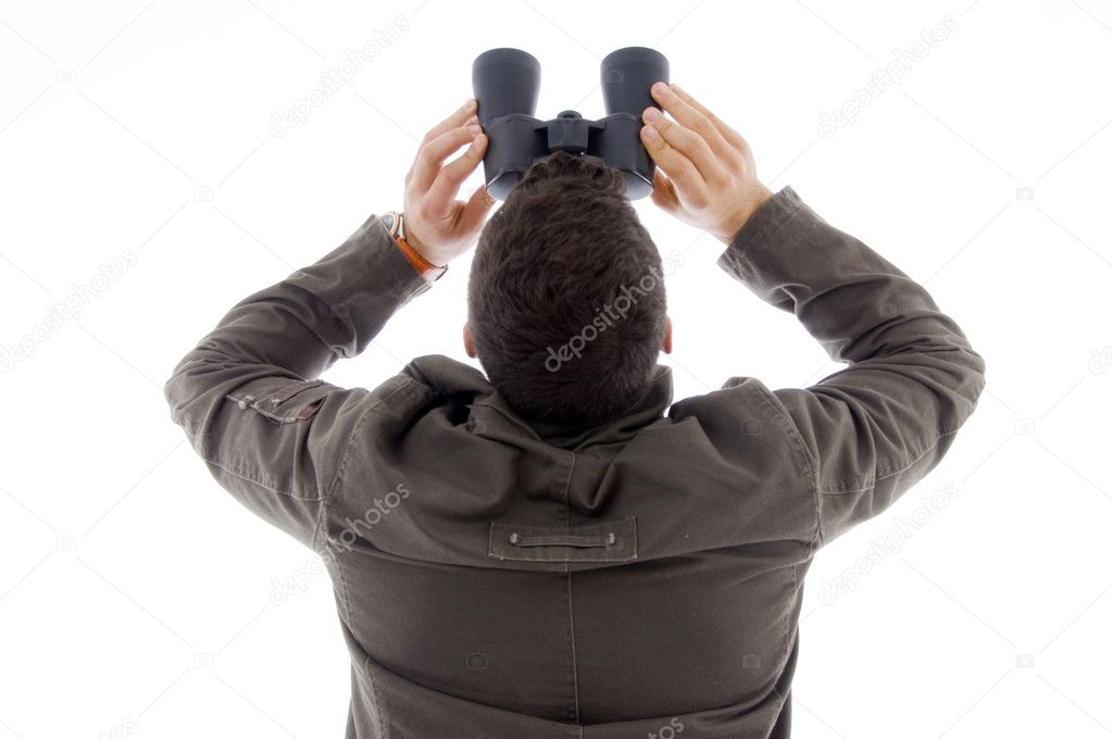 Back pose of man with pair of binoculars