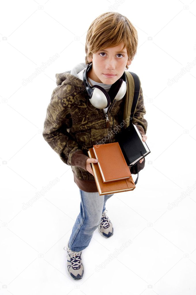 School boy with books and headphones