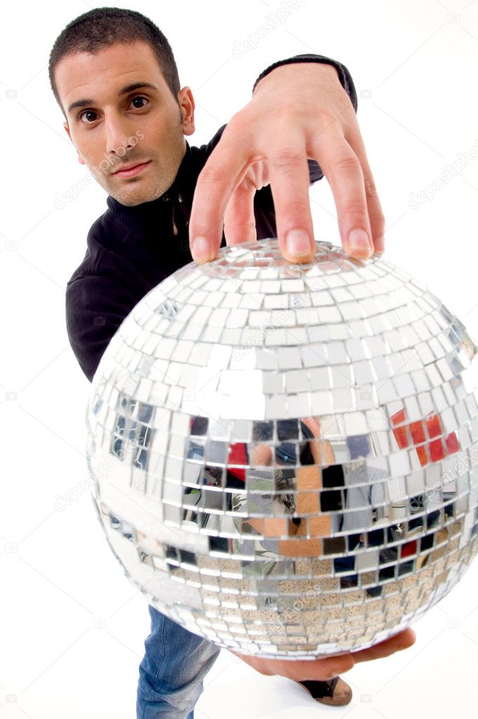 Man holding disco ball like a globe