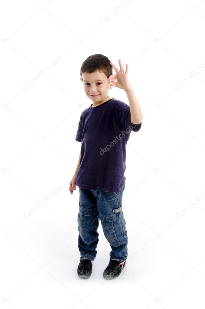 Happy young kid with okay sign gesture