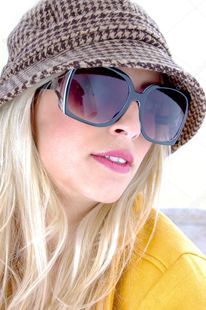 Glamorous woman wearing sunglasses