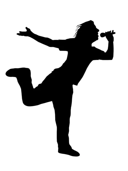 Homem cantando no microfone, posando em uma perna — Fotografia de Stock
