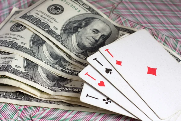 Dollars and 4 aces — Stock Photo, Image