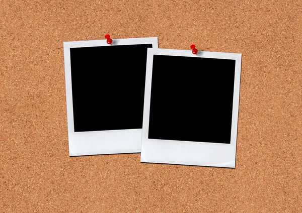Két Polaroid elszigetelt és piros tüske — Stock Fotó