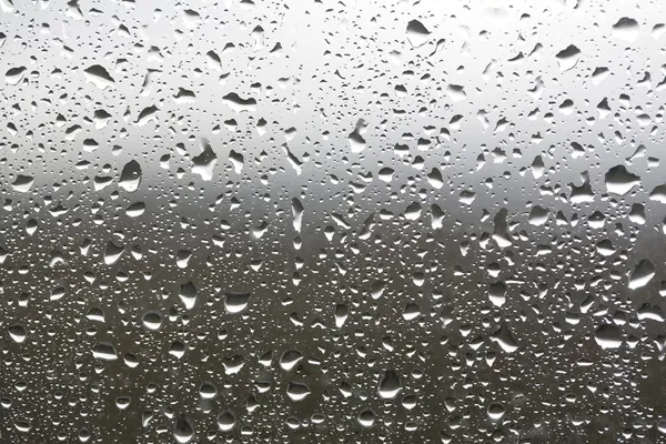 Σταγόνες βροχής σε ένα παράθυρο — Φωτογραφία Αρχείου