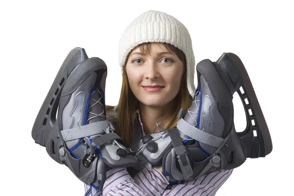 Gelukkig jonge vrouw met ice-skates — Stockfoto