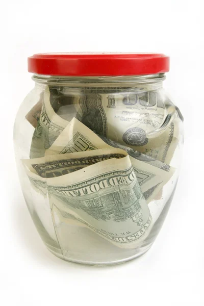 Dollar bills in glass jar — Stock Photo, Image