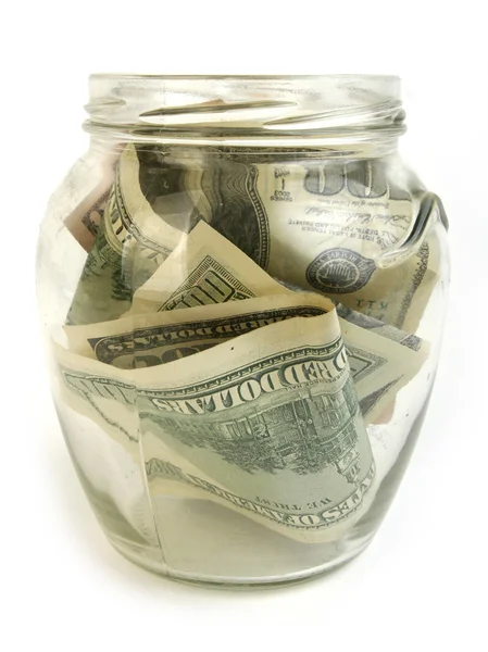 Dollar bills in glass jar — Stock Photo, Image
