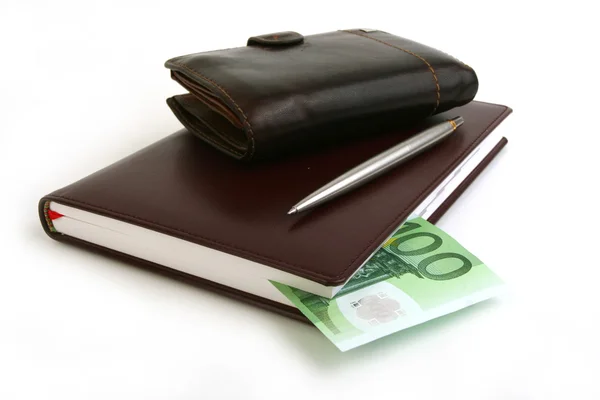 Banknote 100 euro in notebook — Stock Photo, Image