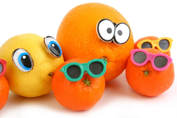 Roliga apelsin, citron och mandariner — Stockfoto