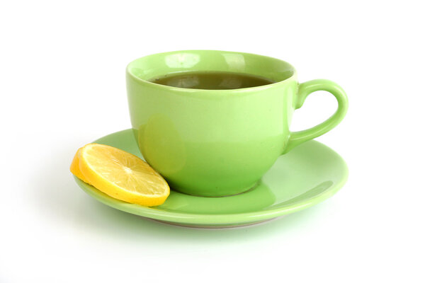 Cup of tea with lemons and sugar on white background