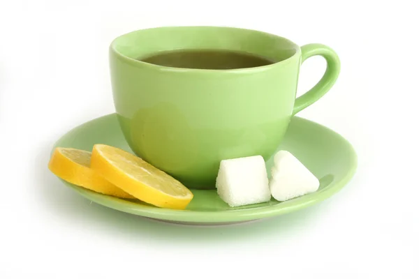 Φλιτζάνι τσάι με τα λεμόνια και ζάχαρη — Φωτογραφία Αρχείου
