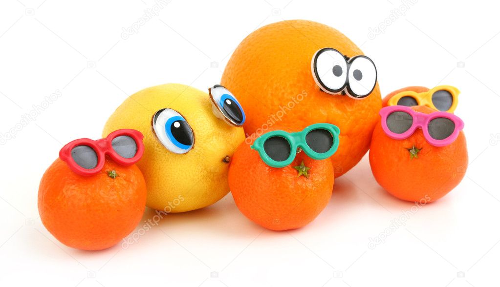 Funny orange, lemon and mandarins