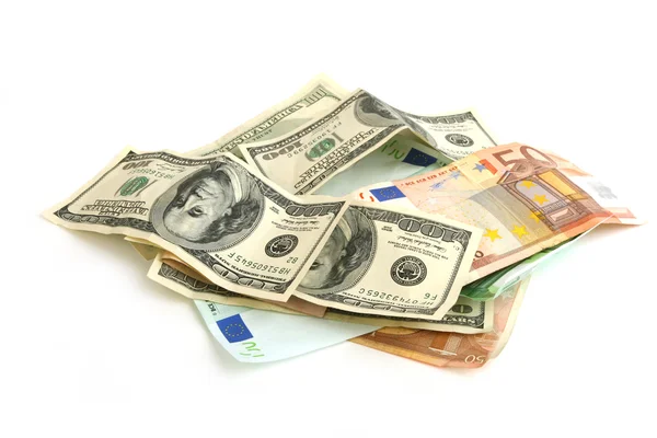 Haldy zmačkaný dolar a euro bankovek — Stock fotografie