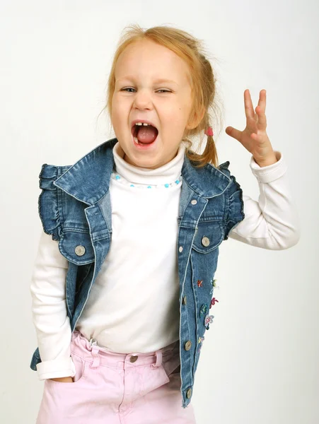 Little showing tongue girl — Stock Photo, Image