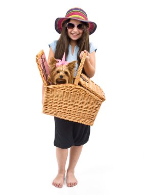 Girl and dog in picnic basket clipart