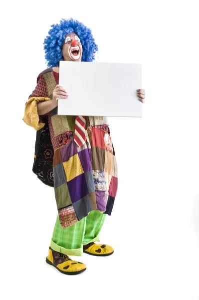 Цирковий клоун тримає знак — стокове фото