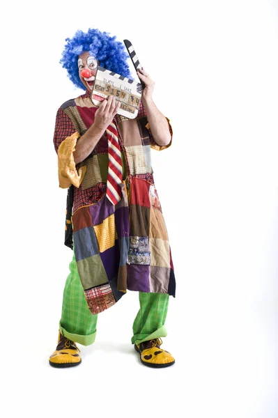 Clown holding a clapper — Stock Photo, Image