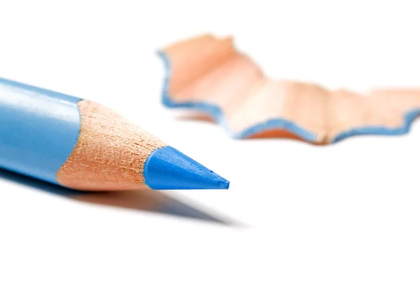 Blue pencil and shaving — Stock Photo, Image