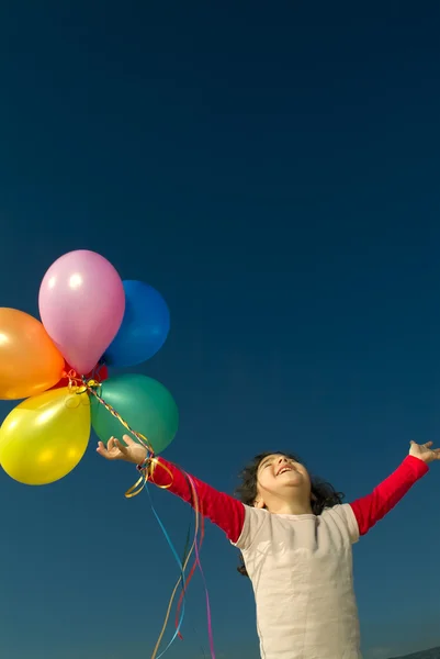 Girl and baloons — Stock Photo, Image