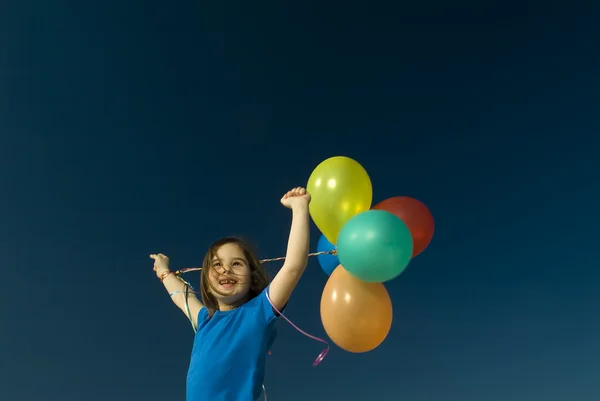 Meisje en baloons — Stockfoto
