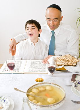 Father and sun celebrating passover clipart