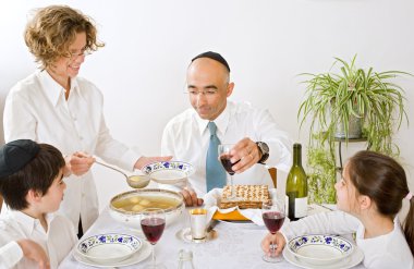 Jewish family celebrating passover clipart