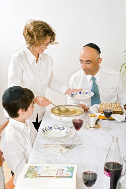 Jewish family celebrating passover clipart